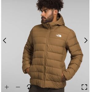 The North Face Big Aconcagua 3 Zip Front Hooded Brown Puffer jacket.